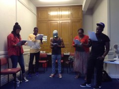 The cast rehearsing  'Such a Long Journey'